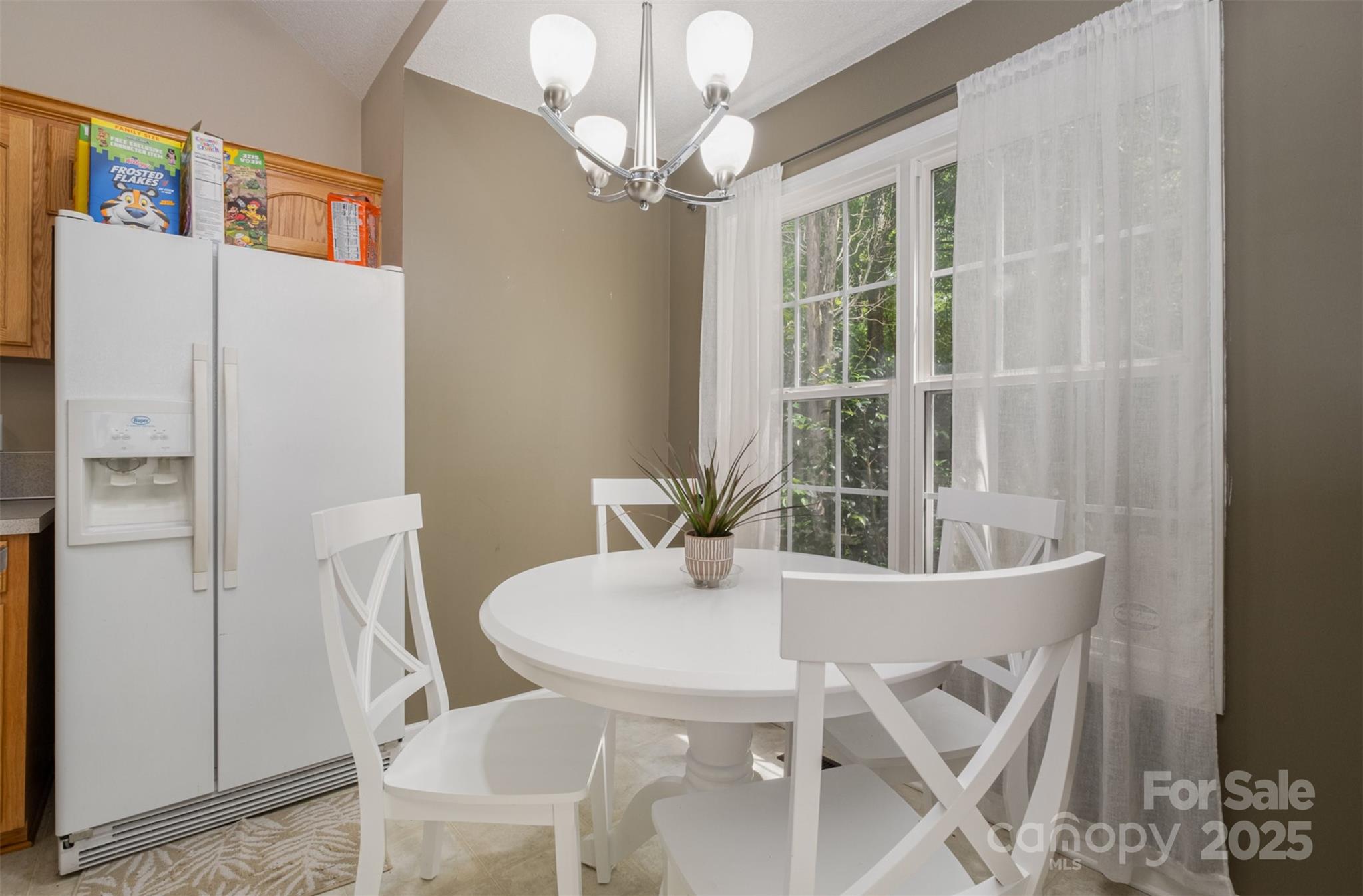 159 Pitts School Road Northwest Concord, NC 28027 - Photo 6 of 31 a view of a dining room with furniture window and outside view