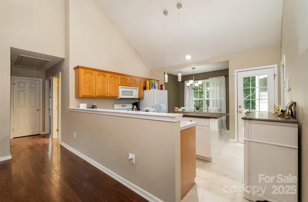 a kitchen with counter top space and stainless steel appliances