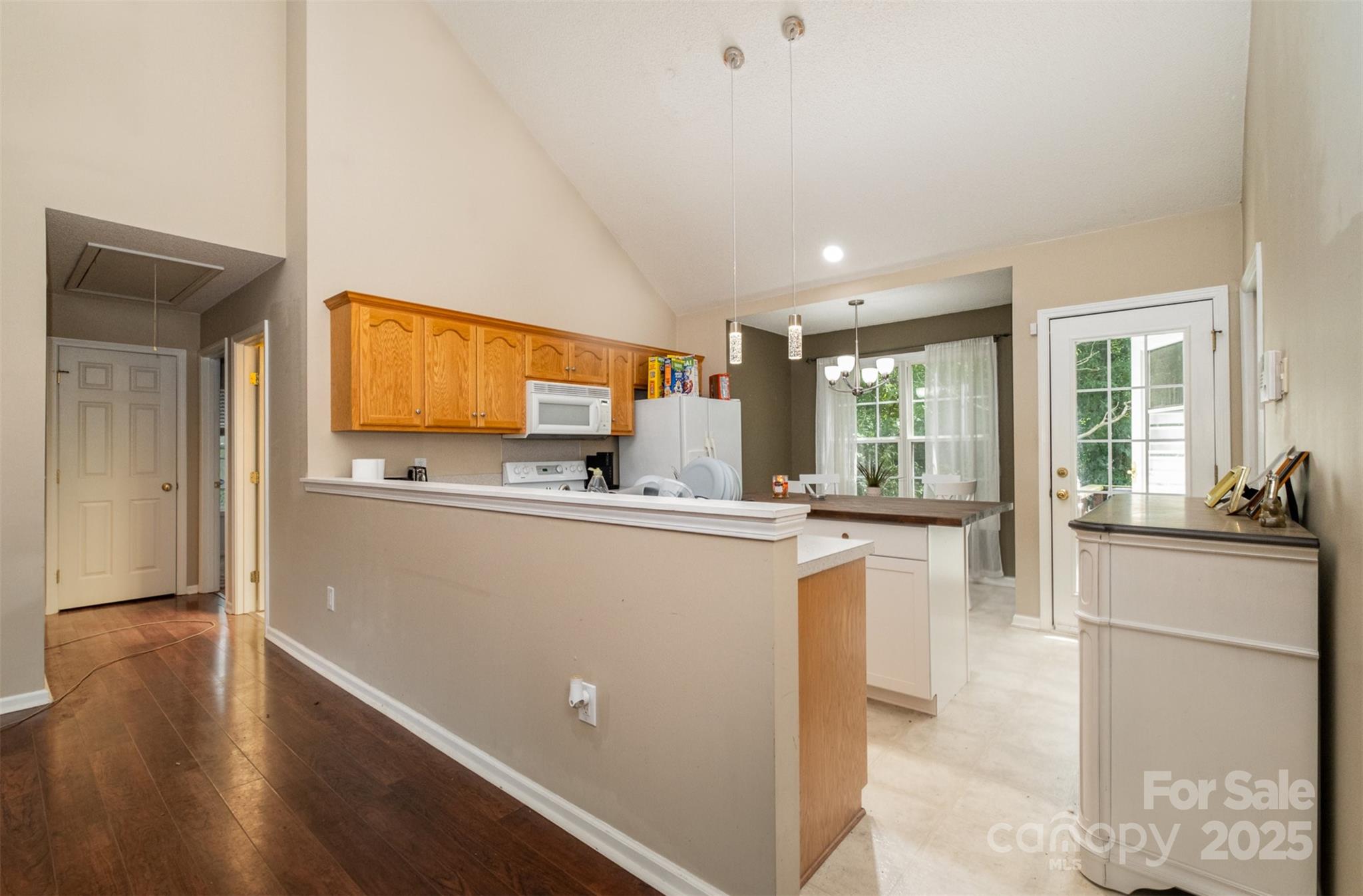 159 Pitts School Road Northwest Concord, NC 28027 - Photo 7 of 31 a kitchen with counter top space and stainless steel appliances