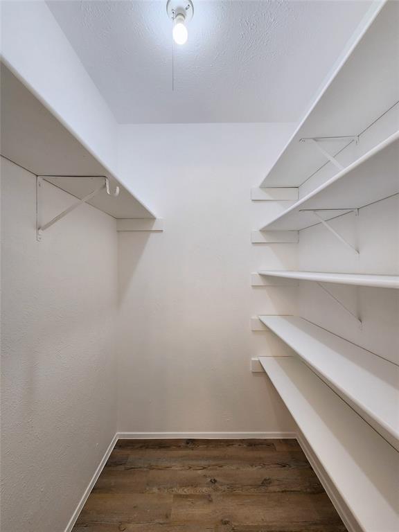 5541 Ragan Drive The Colony, TX 75056 - Photo 20 of 23 a view of an empty walk in closet