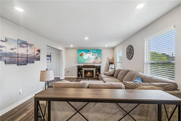 a living room with furniture and window