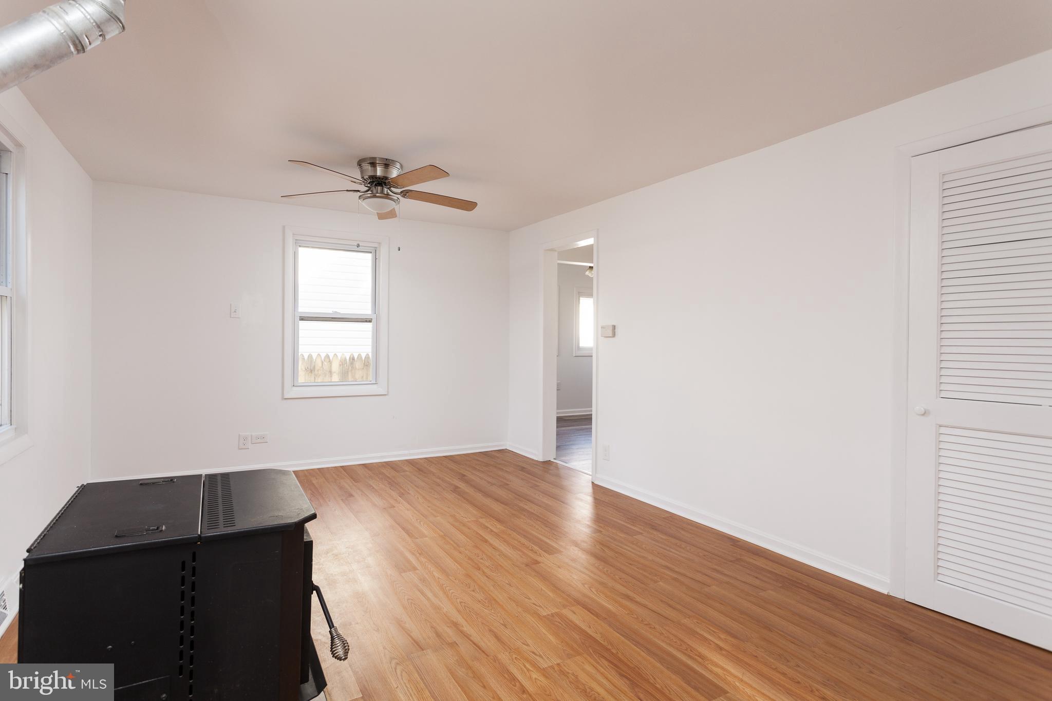 3 Branch Street Baltimore, MD 21221 - Photo 4 of 28 Living Room with Pellet Stove