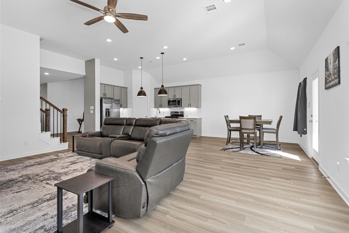 2127 Heather Rdg Way Rosenberg, TX 77471 - Photo 16 of 41 a living room with furniture and a wooden floor