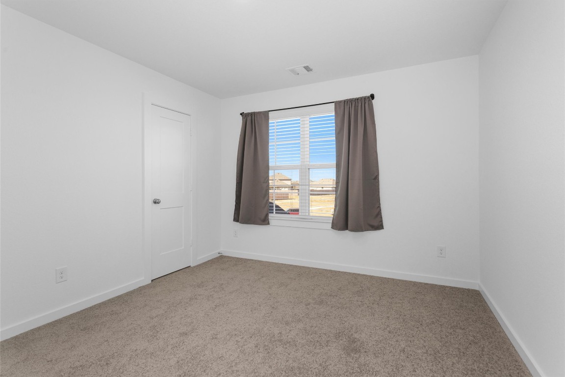 2127 Heather Rdg Way Rosenberg, TX 77471 - Photo 30 of 41 a view of an empty room with a window