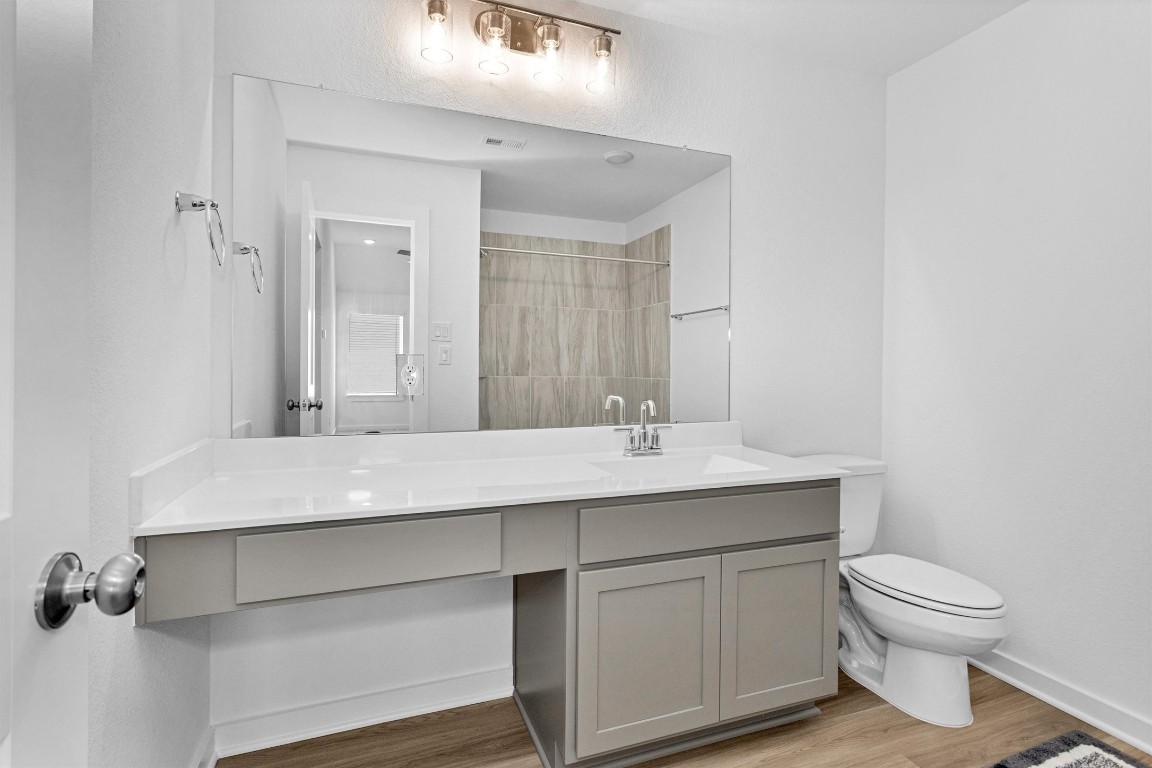 2127 Heather Rdg Way Rosenberg, TX 77471 - Photo 32 of 41 a bathroom with a sink toilet and mirror