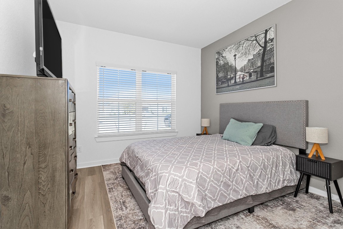 2127 Heather Rdg Way Rosenberg, TX 77471 - Photo 6 of 41 a bedroom with a bed and a window