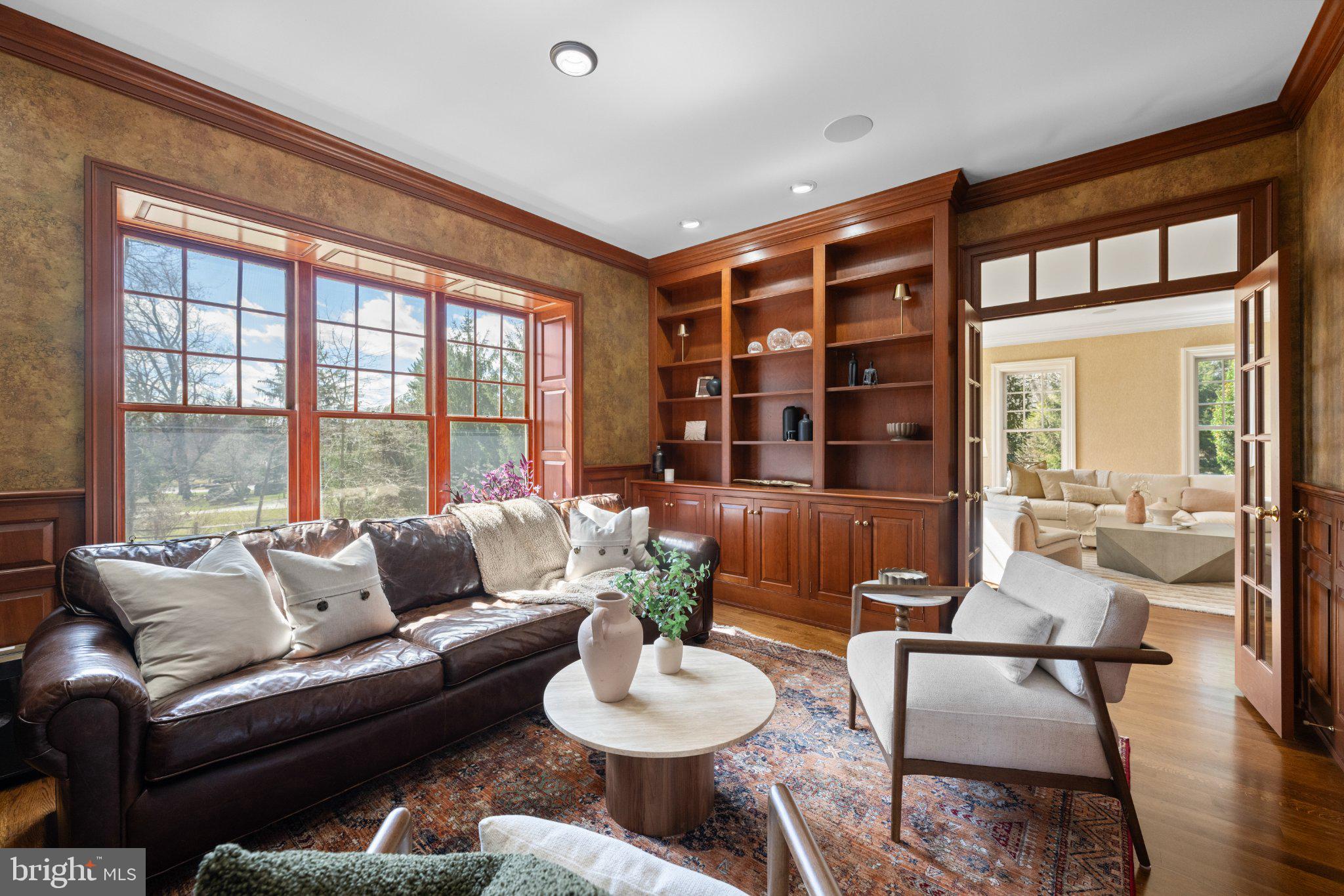 429 Church Road Devon, PA 19333 - Photo 8 of 55 Elegant living space with rich wood accents.