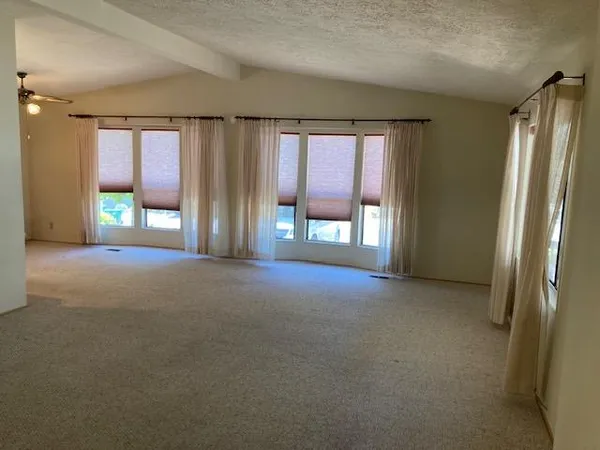 a car parked in front of a house