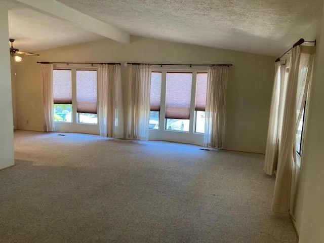 a car parked in front of a house