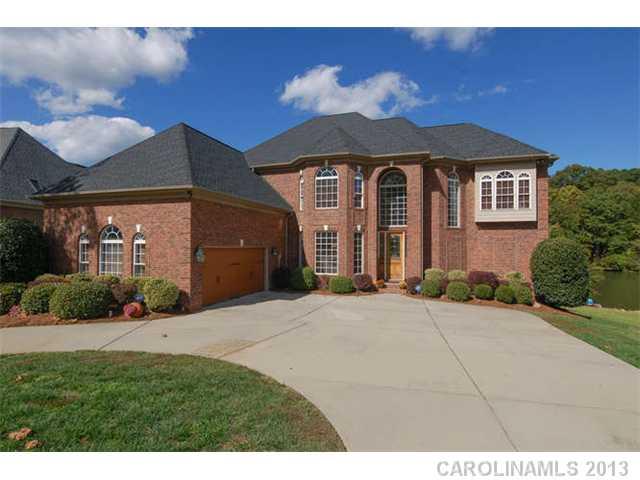 924 Ashford Way Fort Mill, SC 29708 - Photo 1 of 16 a front view of a house with a yard and garage