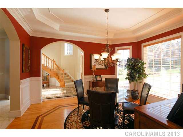 924 Ashford Way Fort Mill, SC 29708 - Photo 3 of 16 a view of a dining room with furniture window and wooden floor