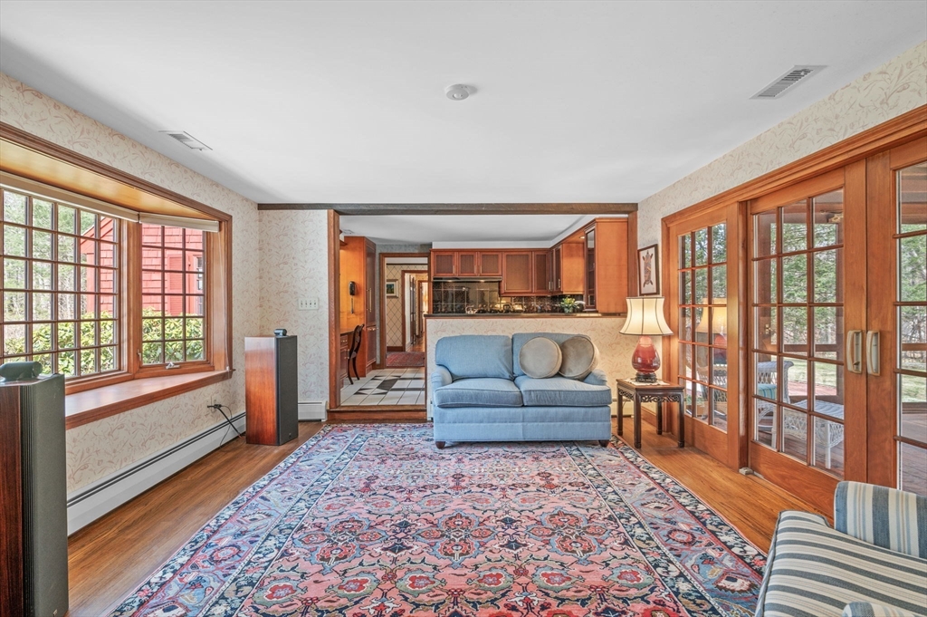 15 Woodland Road Boxford, MA 01921 - Photo 11 of 38 a living room with furniture and a rug