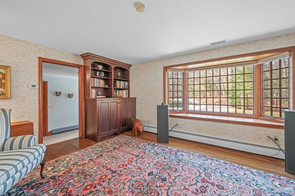 15 Woodland Road Boxford, MA 01921 - Photo 19 of 38 a bedroom with furniture and large window