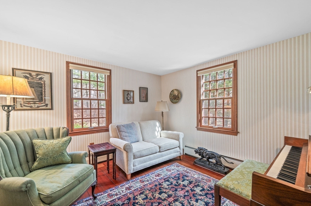 15 Woodland Road Boxford, MA 01921 - Photo 20 of 38 a living room with furniture and a window