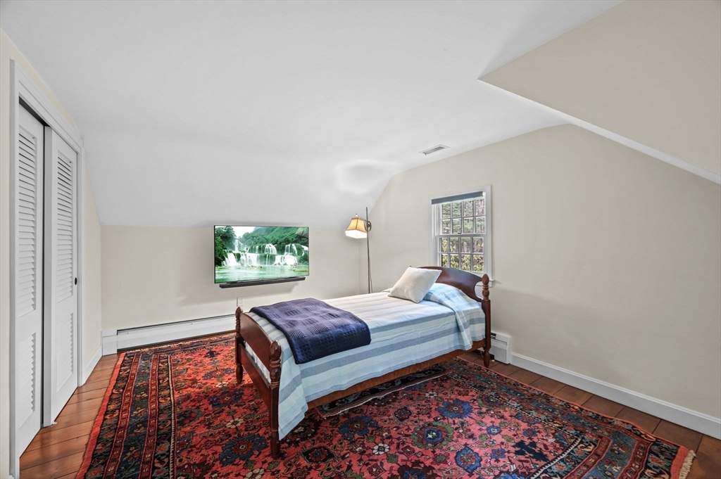 15 Woodland Road Boxford, MA 01921 - Photo 25 of 38 a bed room with a bed and a window