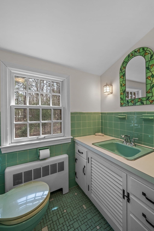 15 Woodland Road Boxford, MA 01921 - Photo 28 of 38 a view of a kitchen that has a sink and a stove