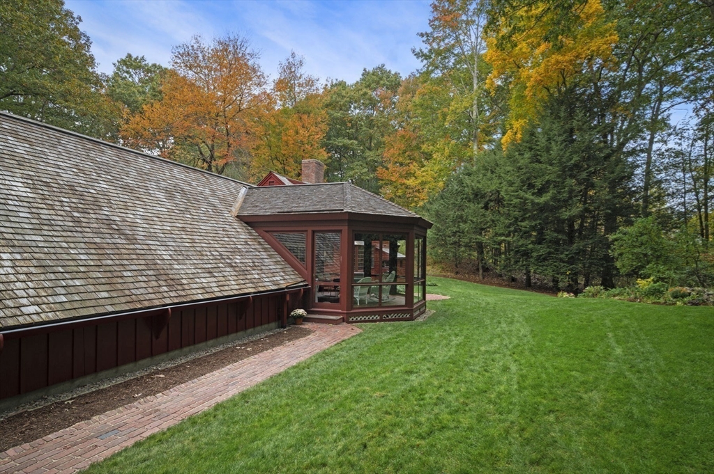 15 Woodland Road Boxford, MA 01921 - Photo 32 of 38 a view of a deck in the backyard