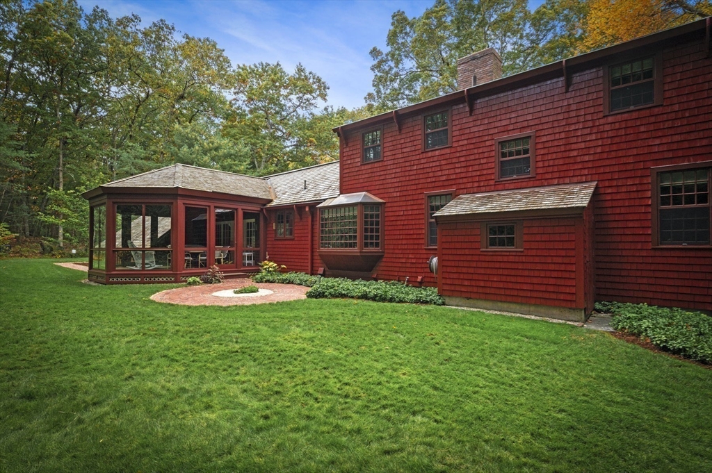 15 Woodland Road Boxford, MA 01921 - Photo 33 of 38 a front view of a house with yard and patio