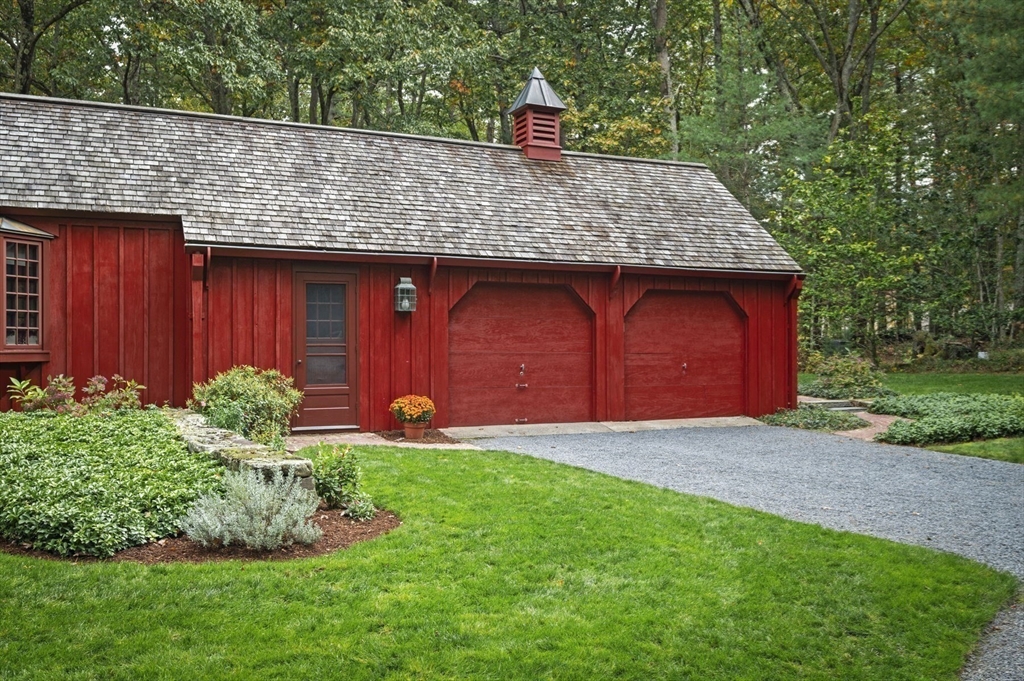 15 Woodland Road Boxford, MA 01921 - Photo 35 of 38 a front view of a house with garden