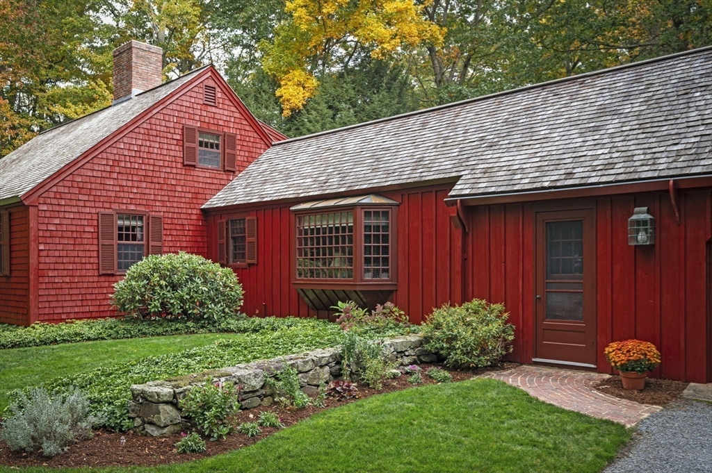 15 Woodland Road Boxford, MA 01921 - Photo 36 of 38 a front view of a house with garden