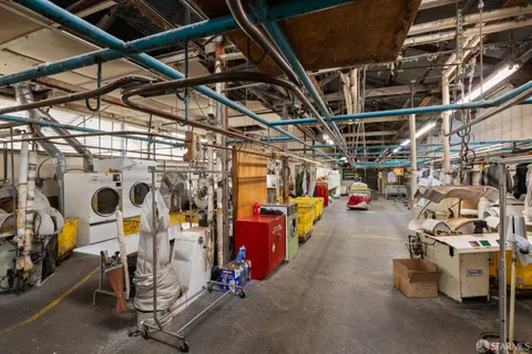 a kitchen with a table and chairs in it