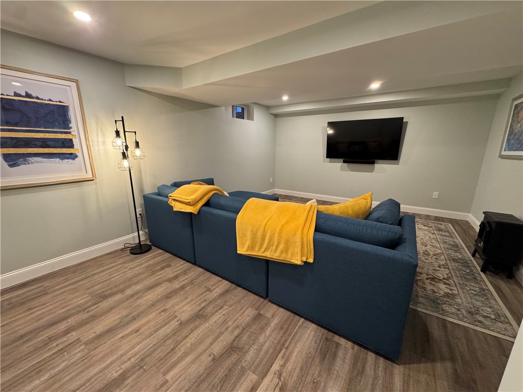 25 Franklin Road, Unit 1 East Greenwich, RI 02818 - Photo 29 of 38 Finished basement offers flex space for Family Room, Home Office, Work Out room or Media Room!