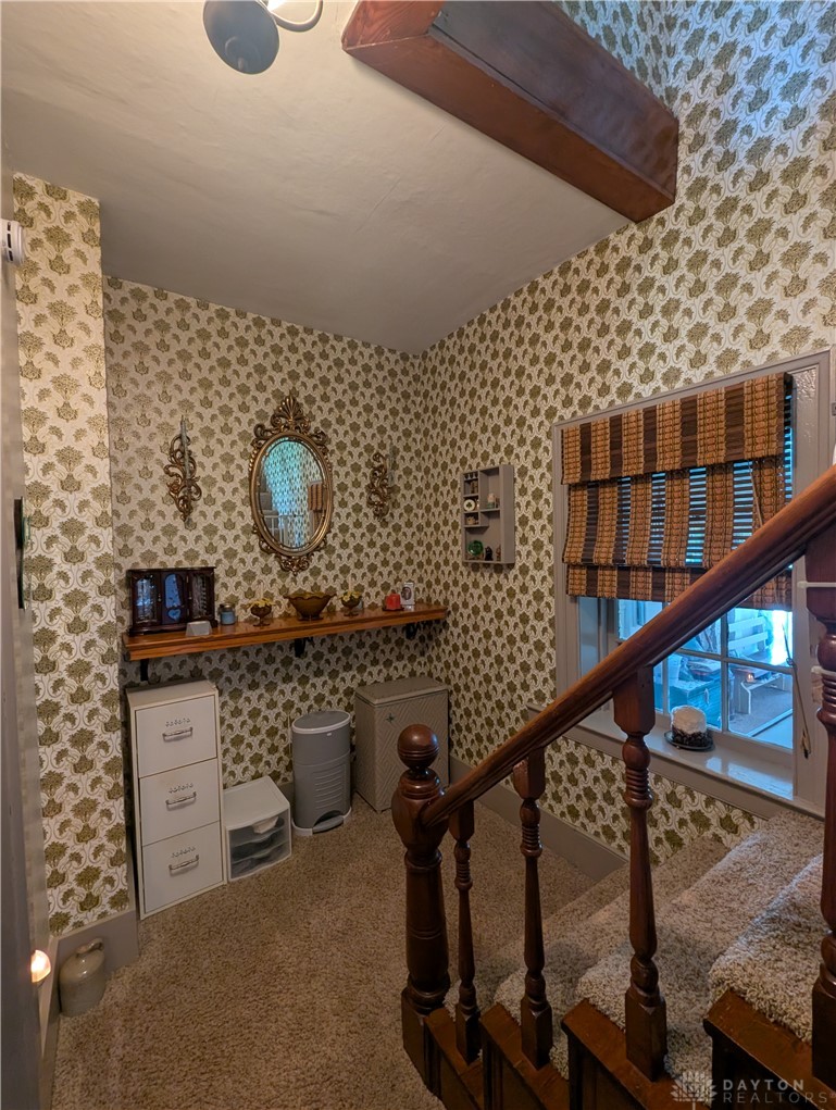 8713 Oakes Road Arcanum, OH 45304 - Photo 23 of 29 This cozy nook features elegant wallpaper and a charming window, creating an inviting space.