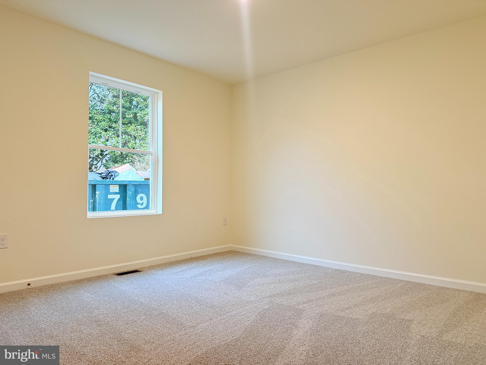 400 North Walnut Street Milford, DE 19963 - Photo 7 of 12 an empty room with a window