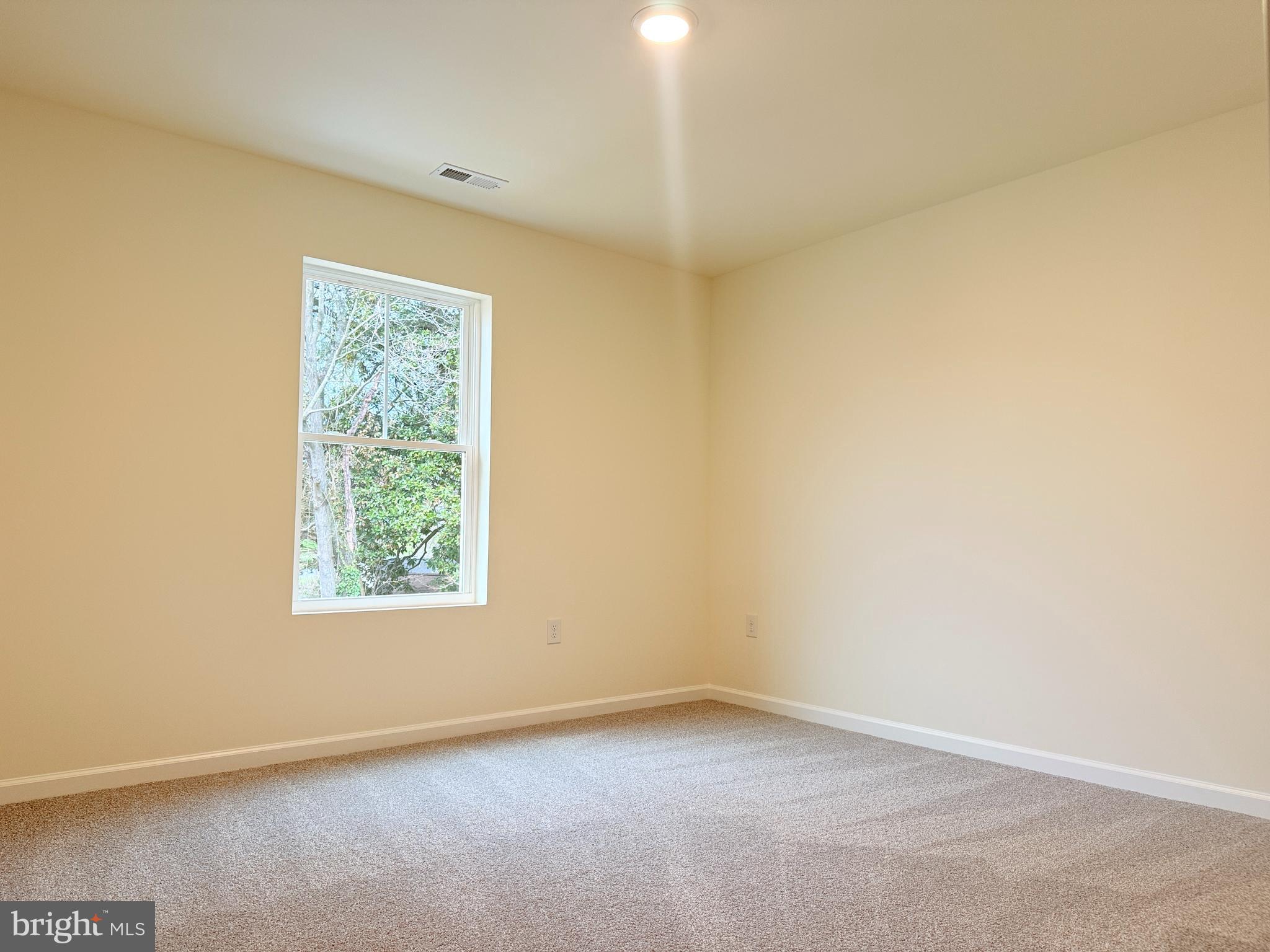 400 North Walnut Street Milford, DE 19963 - Photo 9 of 12 an empty room with a window
