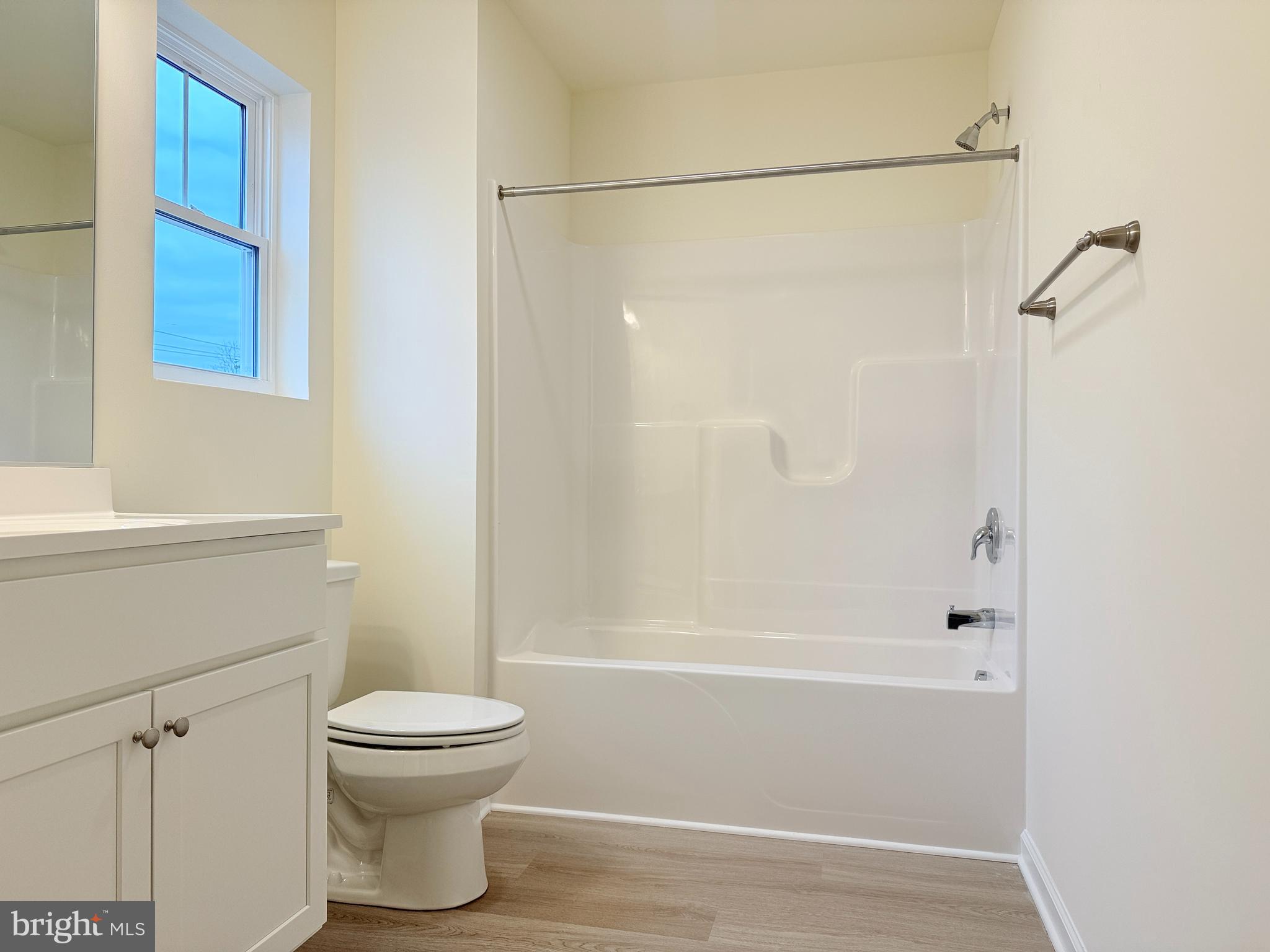 400 North Walnut Street Milford, DE 19963 - Photo 10 of 12 a bathroom with a toilet and a shower