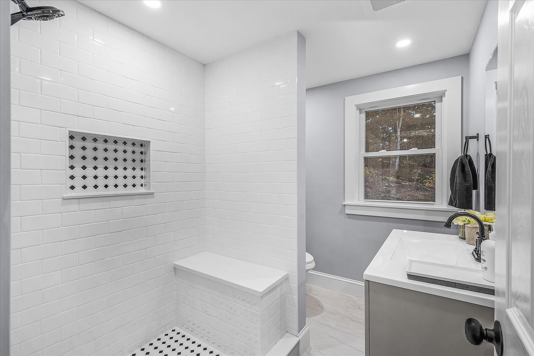 15 Shannon Road Harwich, MA 02645 - Photo 17 of 21 a bathroom with a sink a toilet and a shower
