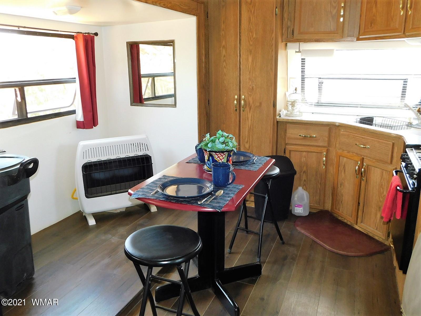 Tbd Aleosa Way Show Low, AZ 85901 - Photo 11 of 27 a view of a dining room with furniture window and wooden floor