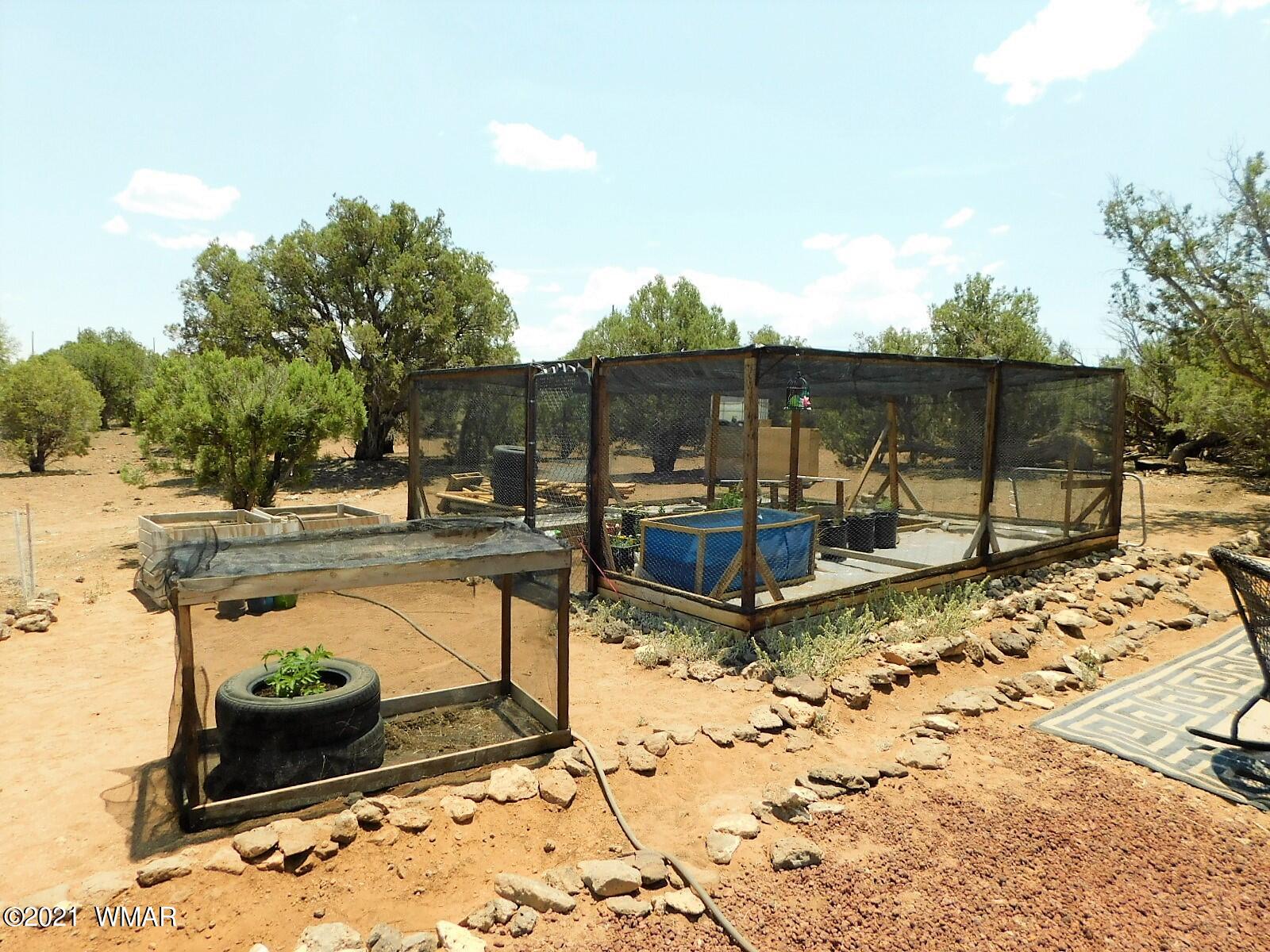 Tbd Aleosa Way Show Low, AZ 85901 - Photo 15 of 27 a view of a swimming pool with a patio