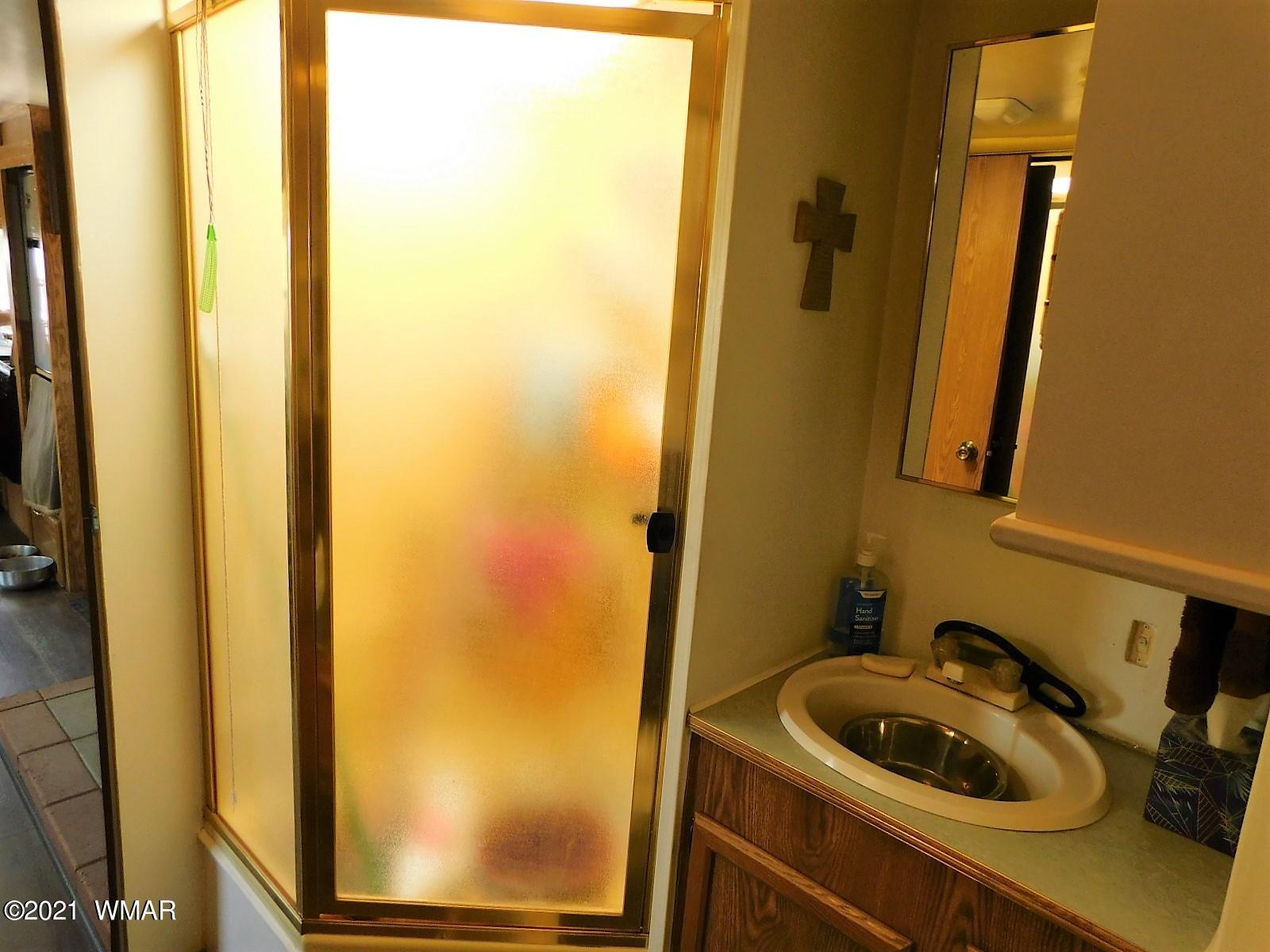 Tbd Aleosa Way Show Low, AZ 85901 - Photo 5 of 27 a bathroom with a sink and a window