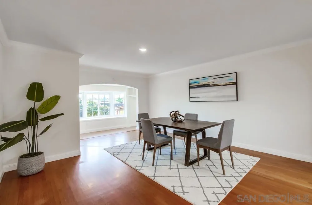 2051 Ridge View Drive San Diego, CA 92105 - Photo 11 of 51 a view of a dining room with furniture and wooden floor