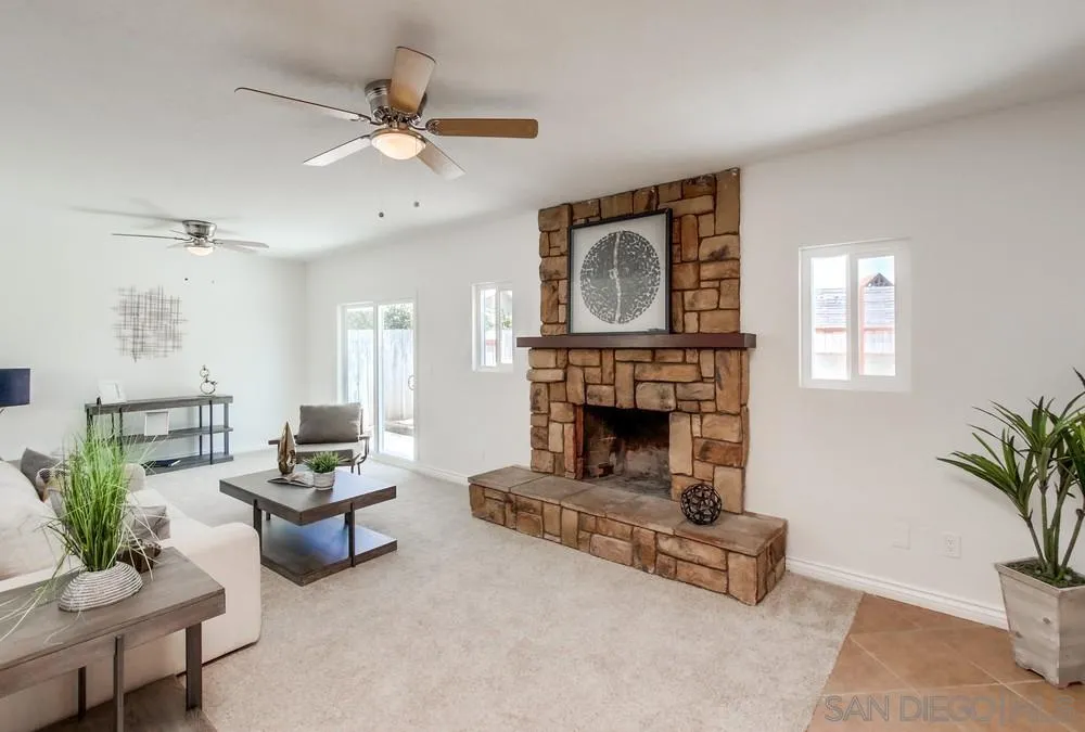 2051 Ridge View Drive San Diego, CA 92105 - Photo 13 of 51 a living room with furniture and a fireplace