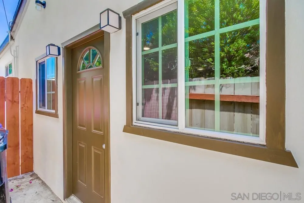 2051 Ridge View Drive San Diego, CA 92105 - Photo 50 of 51 a front view of a house with a large window