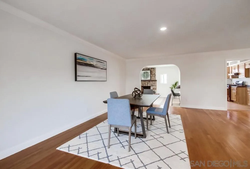 2051 Ridge View Drive San Diego, CA 92105 - Photo 8 of 51 a workspace with furniture and wooden floor