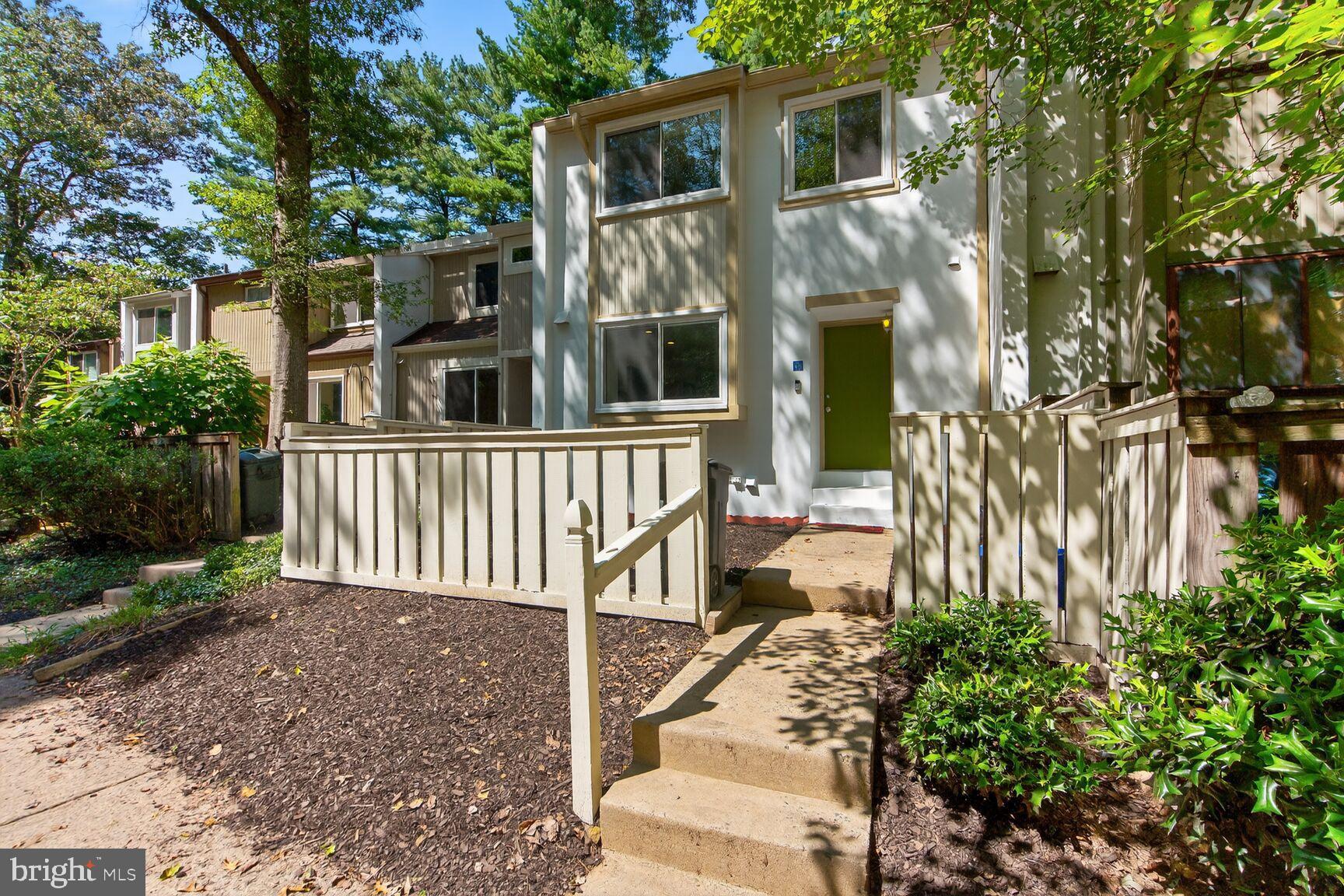 11690 Generation Court Reston, VA 20191 - Photo 1 of 24 Charming townhouse with lush greenery.