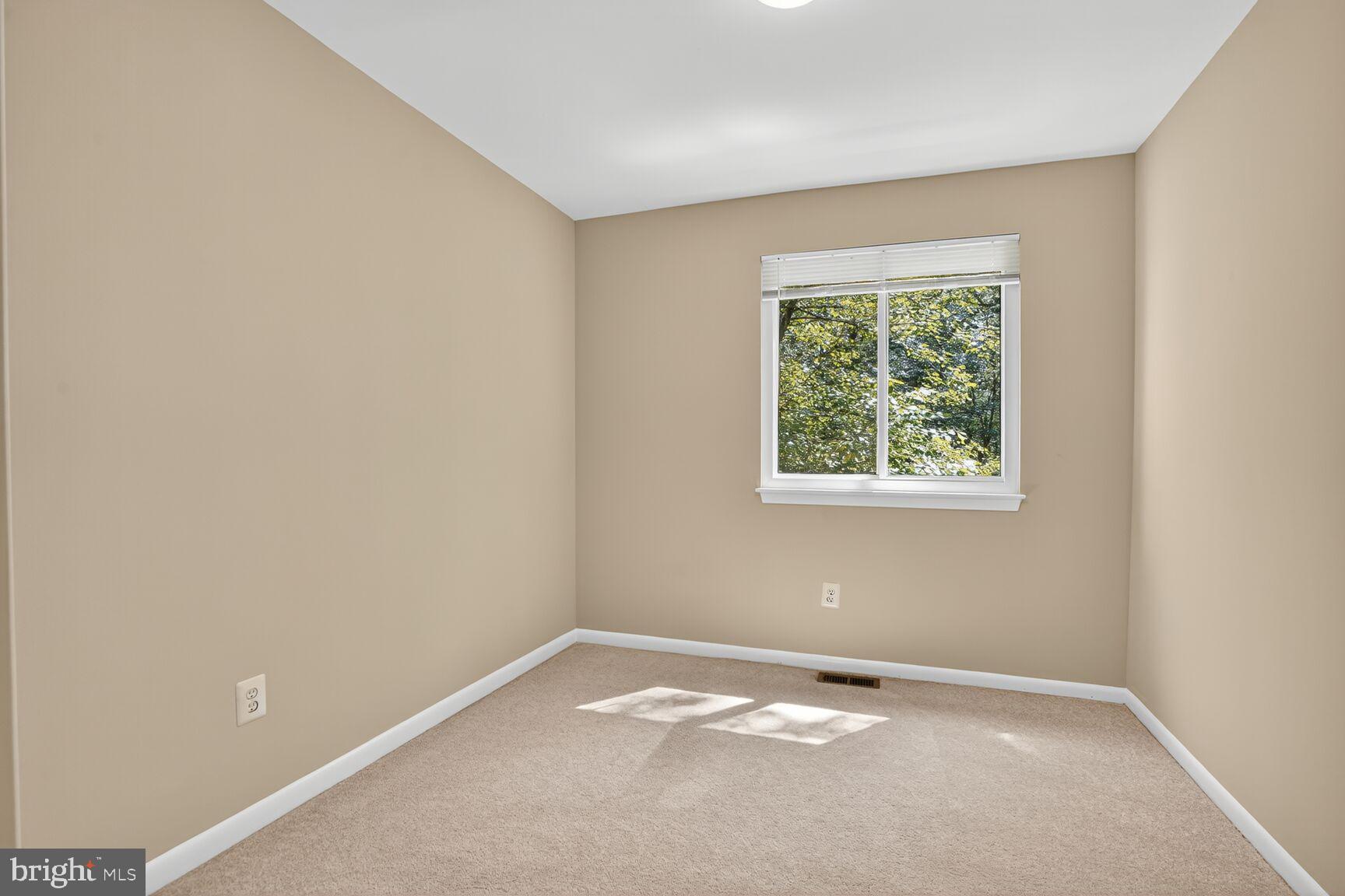 11690 Generation Court Reston, VA 20191 - Photo 14 of 24 Bright and airy bedroom 2 with natural light.