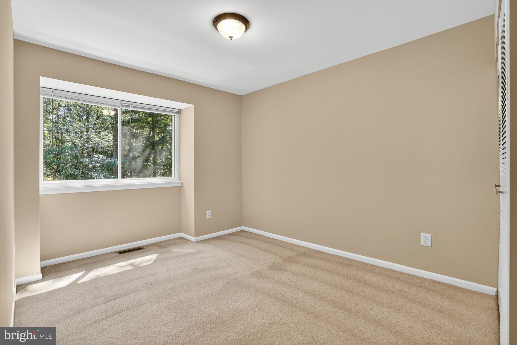 11690 Generation Court Reston, VA 20191 - Photo 16 of 24 Bright and airy bedroom 3 with natural light.