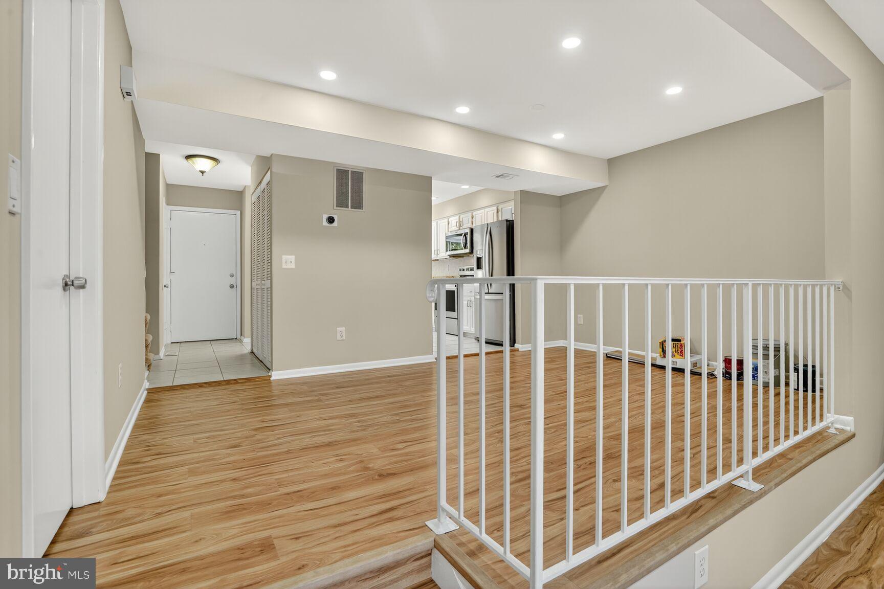 11690 Generation Court Reston, VA 20191 - Photo 2 of 24 Spacious entryway with modern finishes.