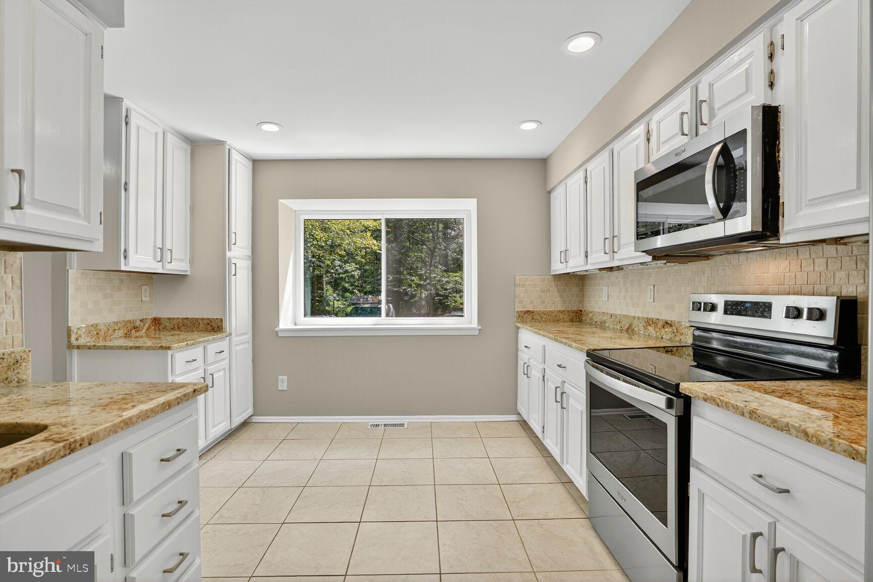 11690 Generation Court Reston, VA 20191 - Photo 3 of 24 Bright and modern kitchen with ample space.