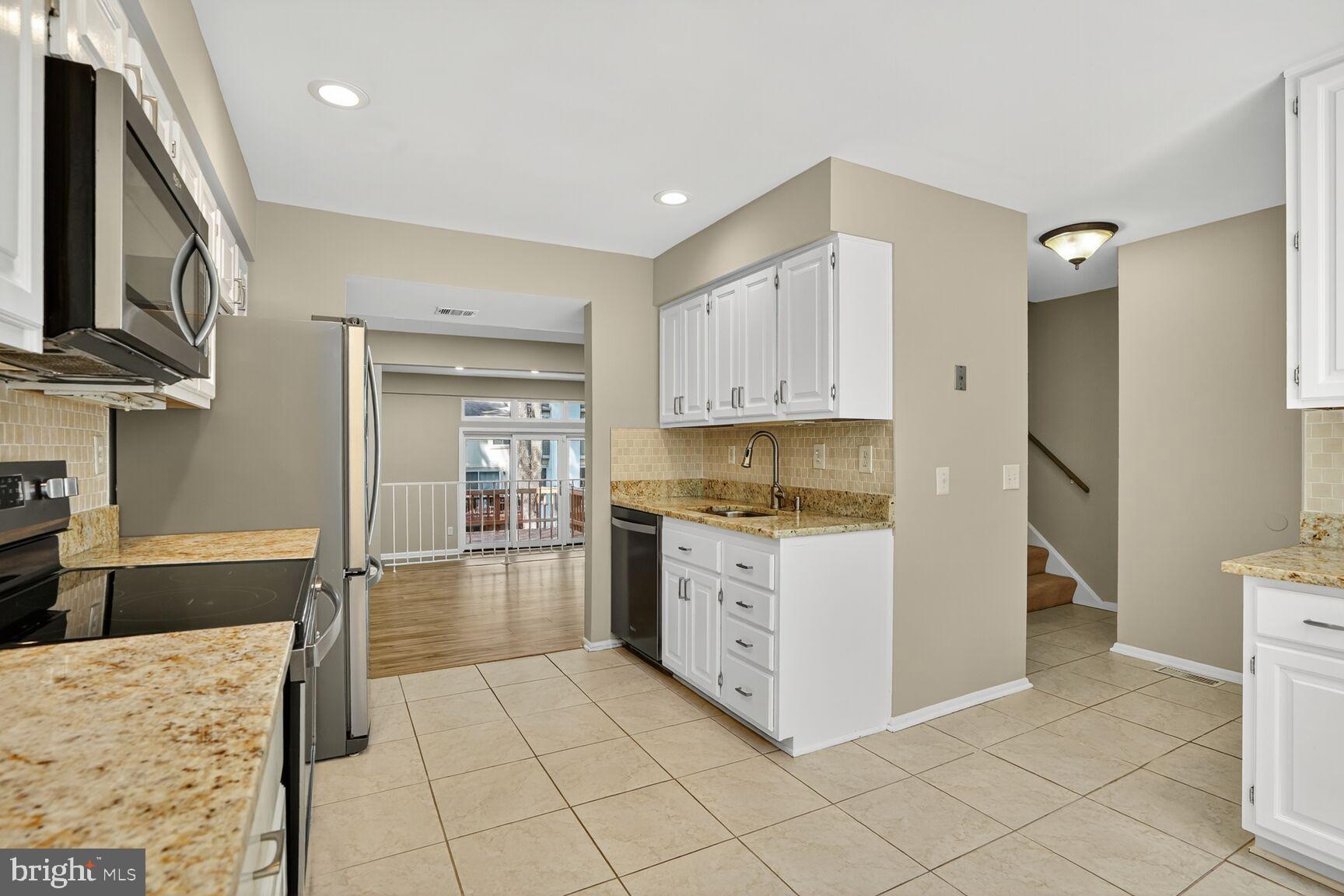 11690 Generation Court Reston, VA 20191 - Photo 4 of 24 Modern kitchen with elegant finishes.