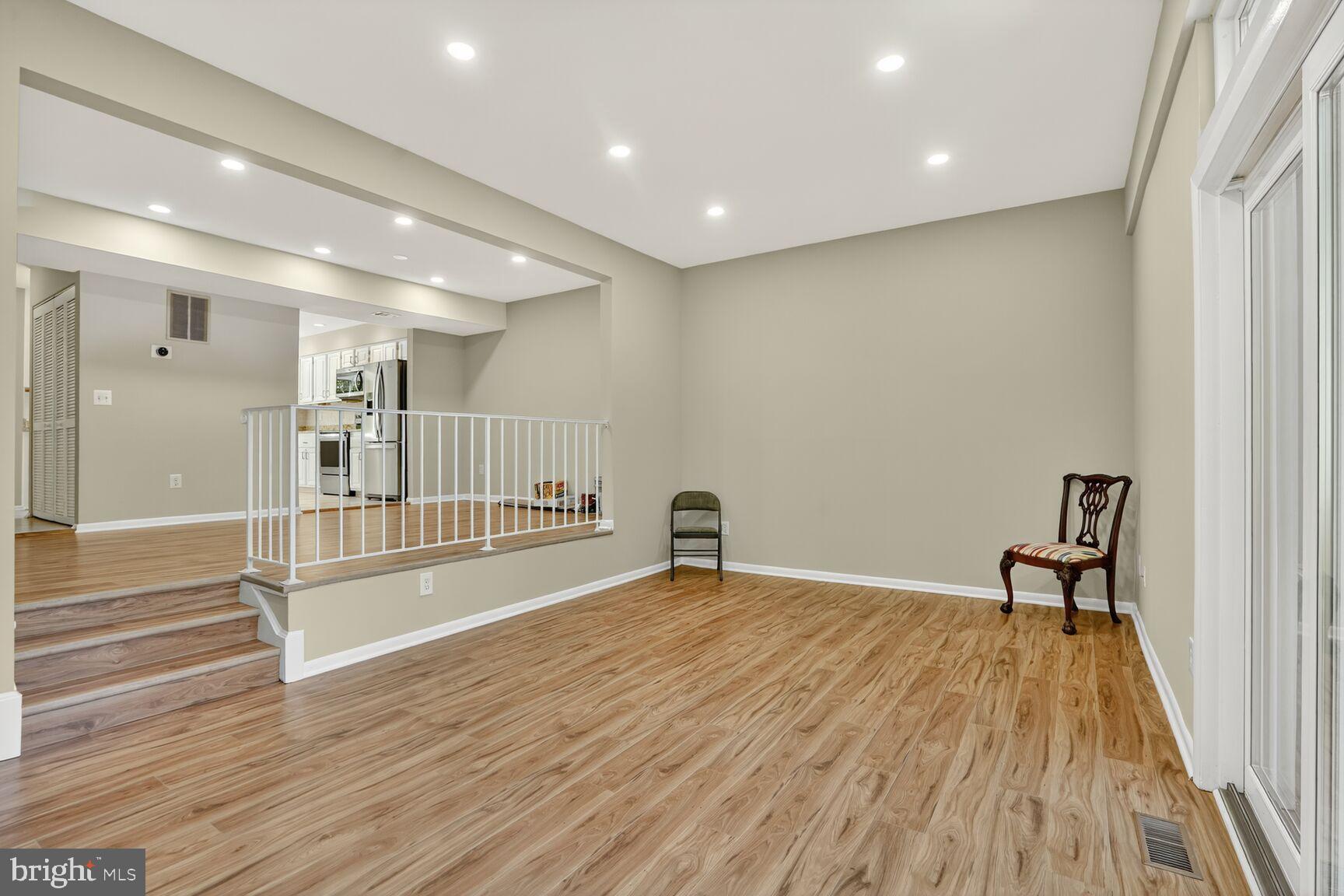 11690 Generation Court Reston, VA 20191 - Photo 5 of 24 Spacious, light-filled living area awaits you.