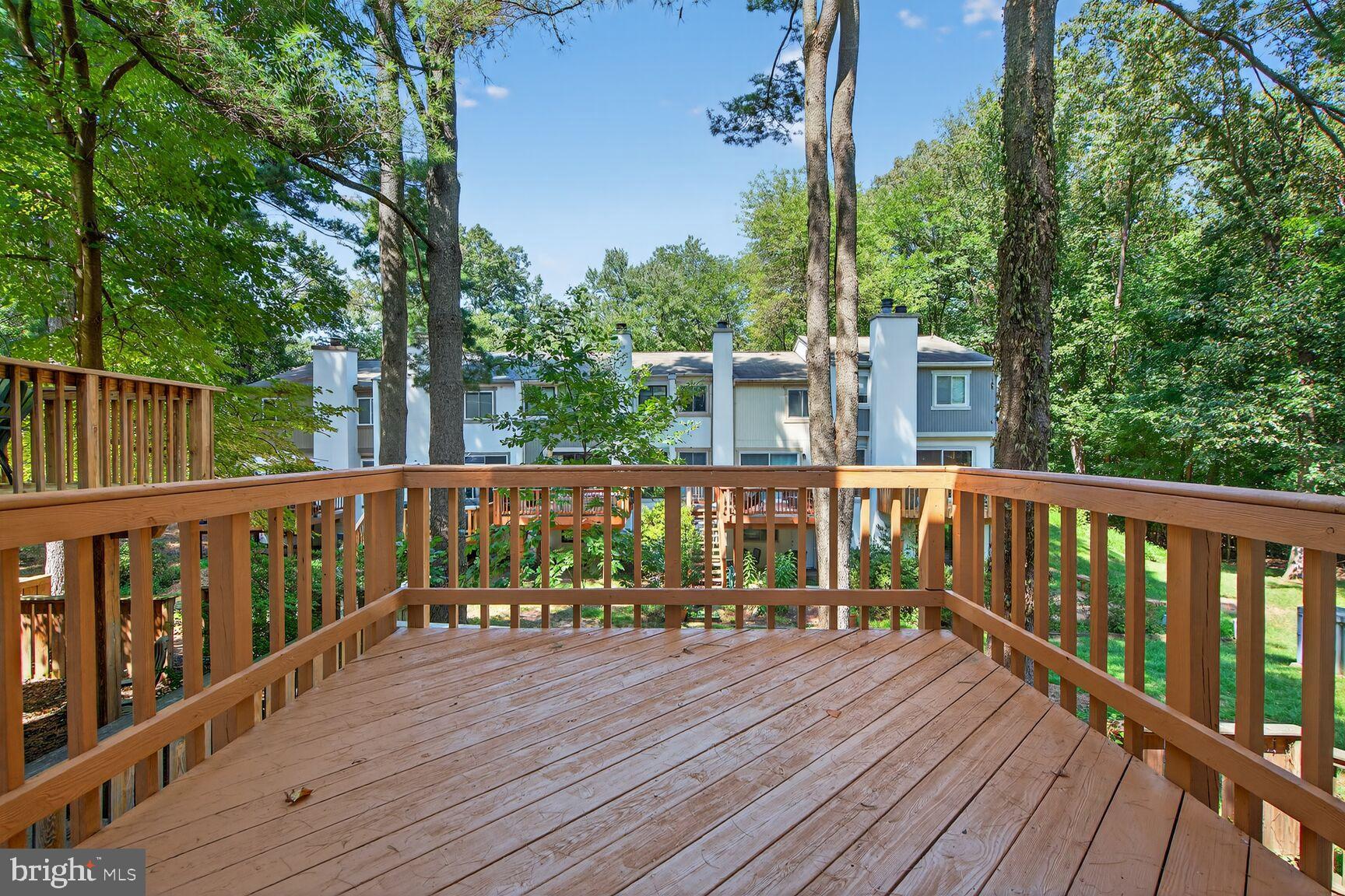 11690 Generation Court Reston, VA 20191 - Photo 9 of 24 Serene deck overlooking lush greenery.