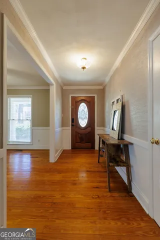 a view of a livingroom with furniture and wooden floor