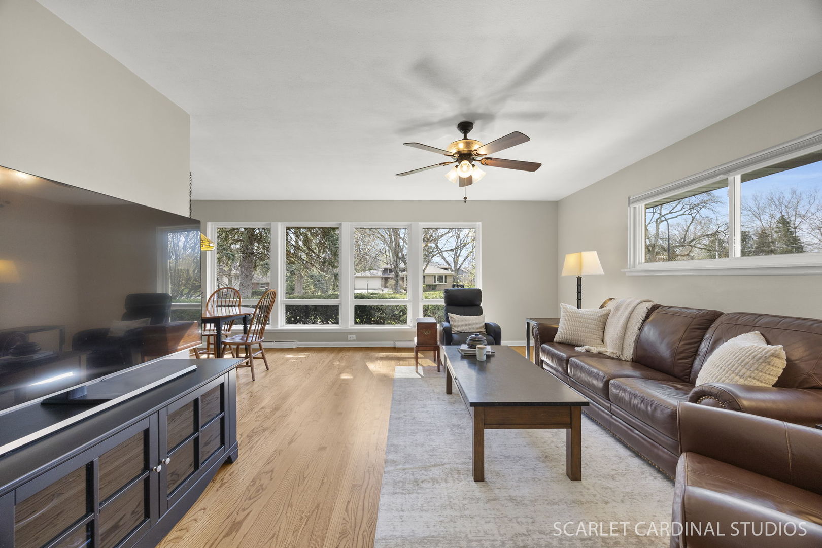 9 Notre Dame Drive Naperville, IL 60540 - Photo 5 of 24 a living room with furniture and a large window