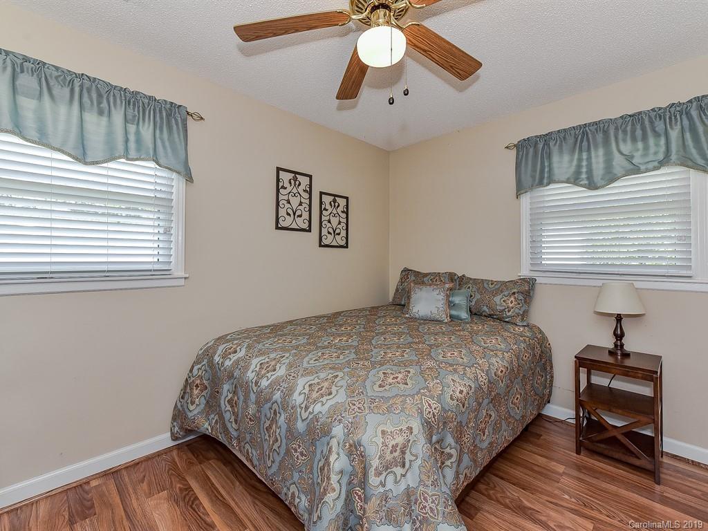507 Sikes Mill Road Monroe, NC 28110 - Photo 26 of 40 a bedroom with bed and a window