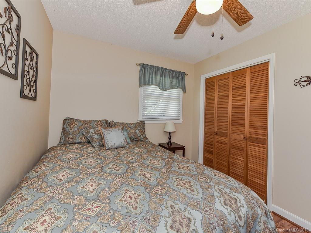 507 Sikes Mill Road Monroe, NC 28110 - Photo 27 of 40 a bedroom with a bed and a window